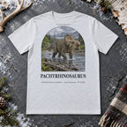 Pachyrhinosaurus t-shirt flat lay – ash PaleoThreads paleo art tee on frosty slate with an antler