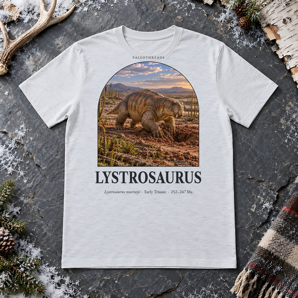 Lystrosaurus t-shirt flat lay – ash PaleoThreads paleo art tee on frosty slate with an antler